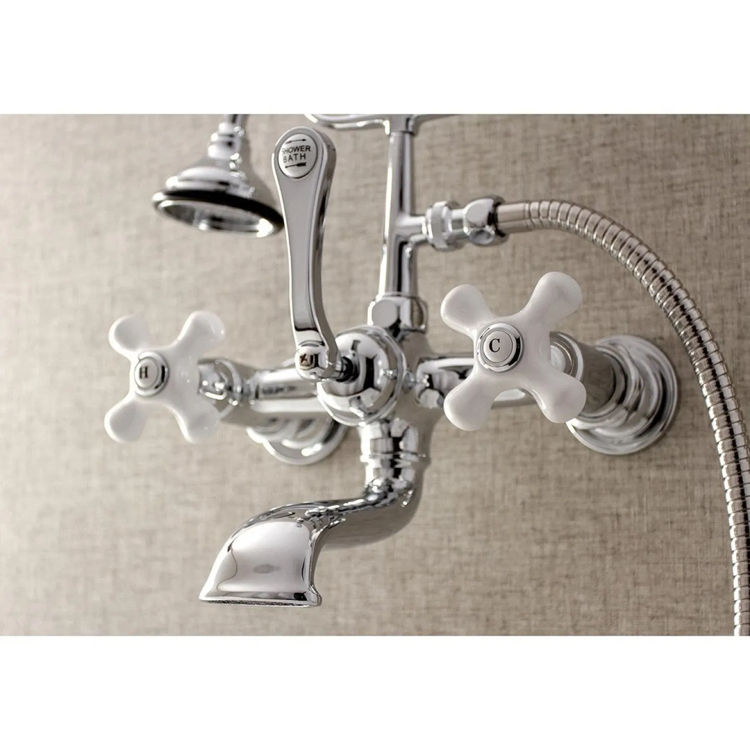 Kingston Brass Aqua Vintage 7-Inch Wall Mount Tub Faucet with Hand Shower
