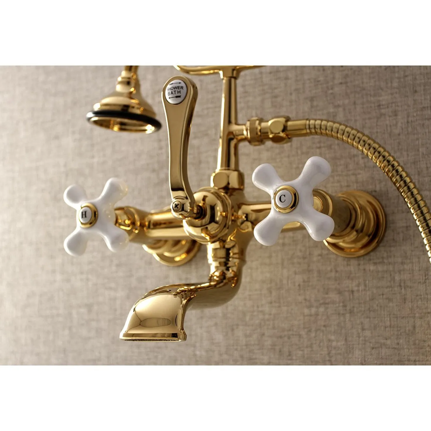 Kingston Brass Aqua Vintage 7-Inch Wall Mount Tub Faucet with Hand Shower