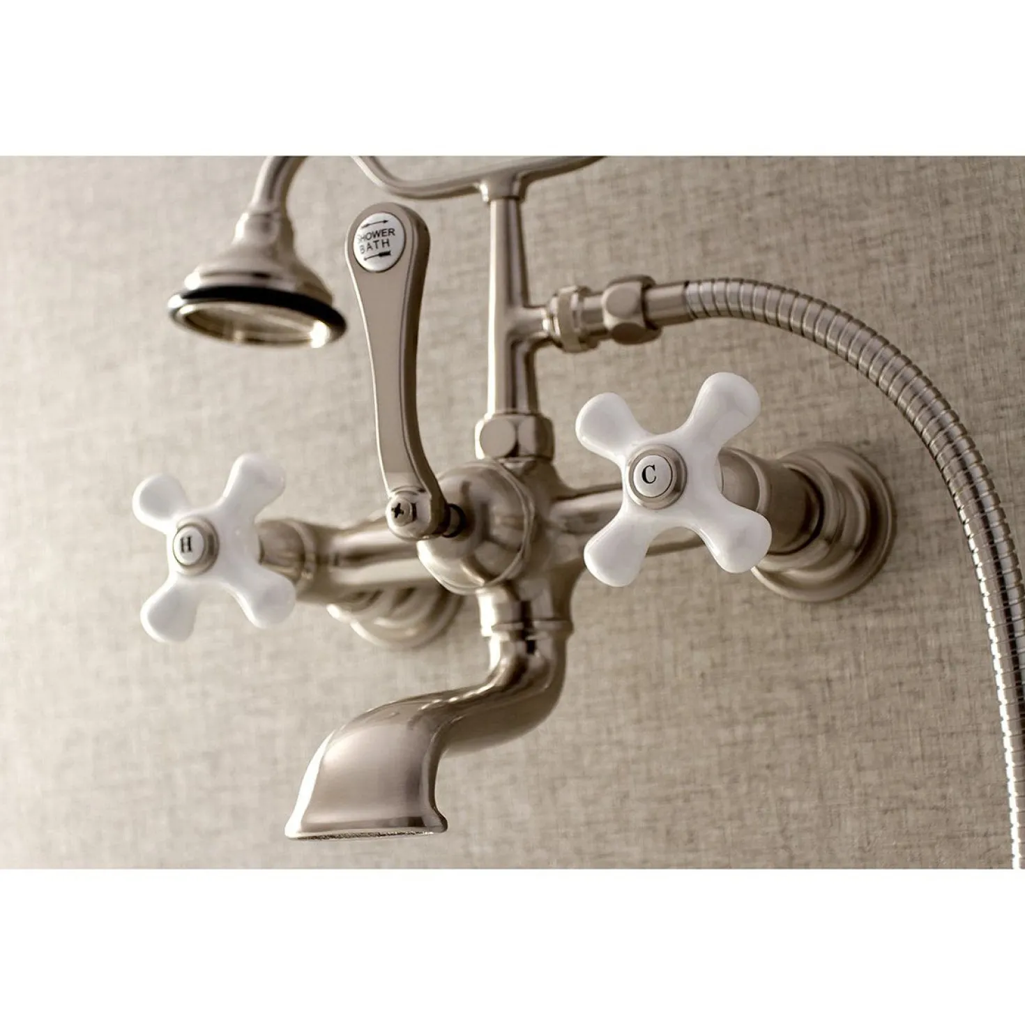 Kingston Brass Aqua Vintage 7-Inch Wall Mount Tub Faucet with Hand Shower