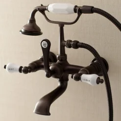 Kingston Brass Aqua Vintage Wall Mount Tub Faucet with Hand Shower