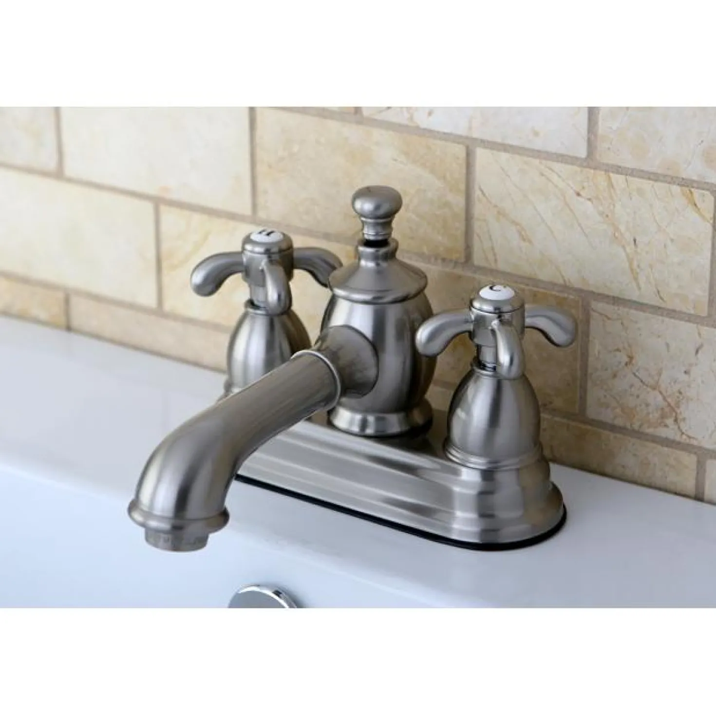 Kingston Brass 4" Centerset Lavatory Faucet with Heritage Spout and Metal Cross Handle