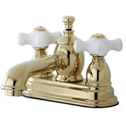 Kingston Brass 4" Centerset Lavatory Faucet with Heritage Spout and Porcelain Cross Handle