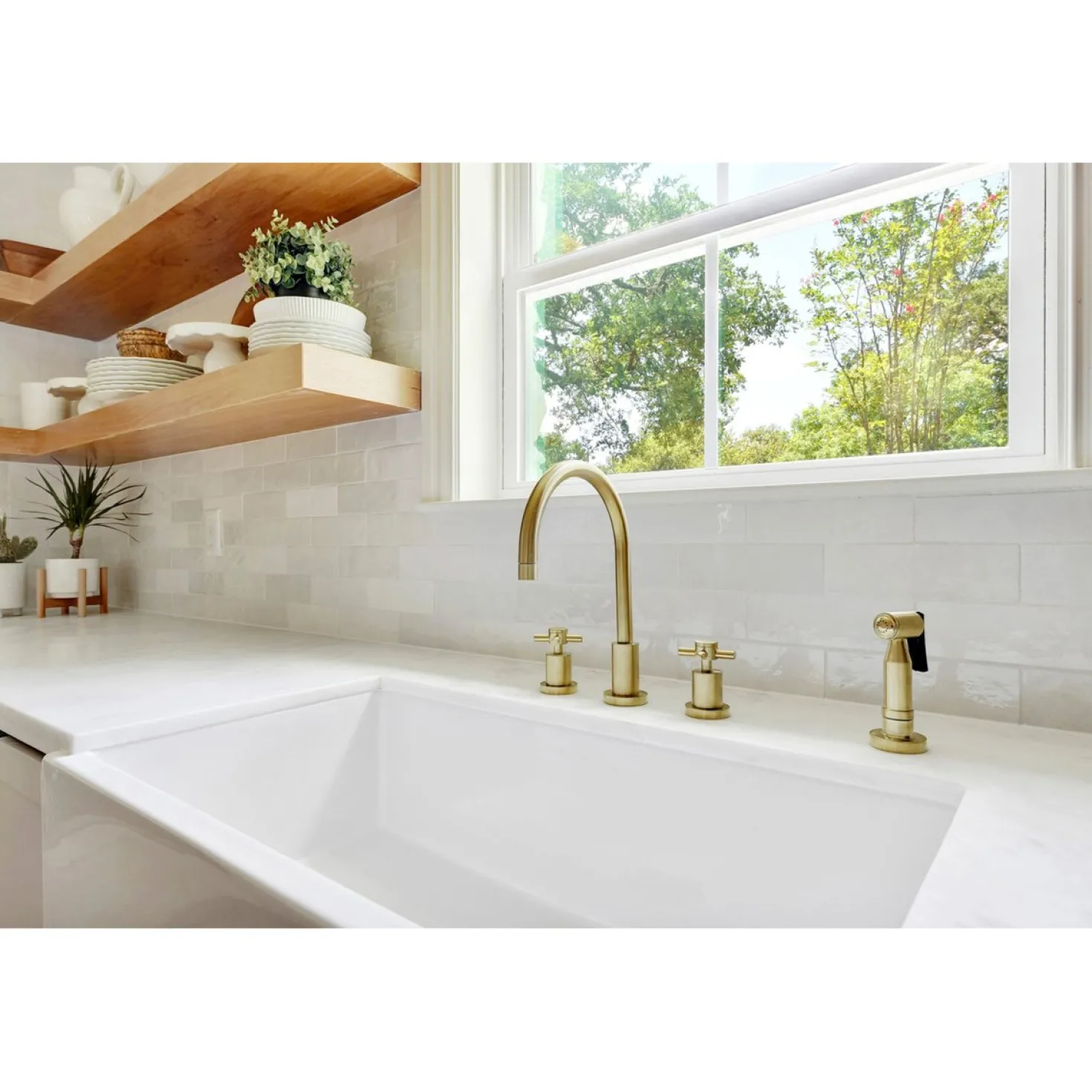 Kingston Brass Concord Deck Mount 8-Inch Widespread Kitchen Faucet with Brass Sprayer