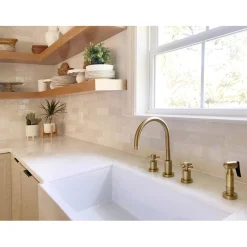 Kingston Brass Concord Deck Mount 8-Inch Widespread Kitchen Faucet with Brass Sprayer