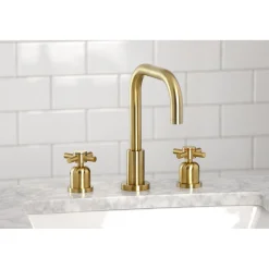 Kingston Brass Concord Deck Mount Widespread Bathroom Faucet with Brass Pop-Up