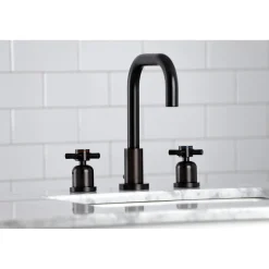 Kingston Brass Concord Deck Mount Widespread Bathroom Faucet with Brass Pop-Up