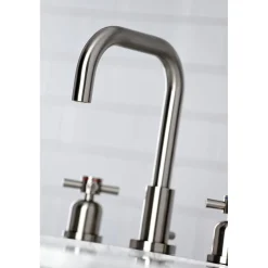 Kingston Brass Concord Deck Mount Widespread Bathroom Faucet with Brass Pop-Up