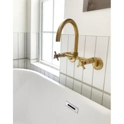 Kingston Brass Concord 2-Hole 8-Inch Adjustable Center Wall Mount Kitchen Faucet