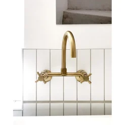 Kingston Brass Concord 2-Hole 8-Inch Adjustable Center Wall Mount Kitchen Faucet