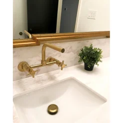 Kingston Brass Concord 8-Inch Adjustable Center Wall Mount Kitchen Faucet