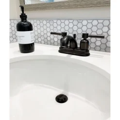 Kingston Brass Concord 4-Inch Centerset 3-Hole Bathroom Faucet with Retail Pop-Up