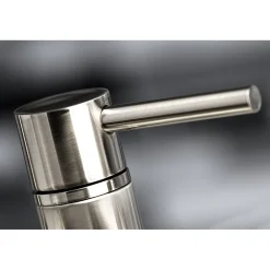 Kingston Brass Concord Two-Handle Deck Mount Bridge Kitchen Faucet with Brass Side Sprayer