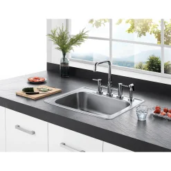 Kingston Brass Concord Two-Handle Deck Mount Bridge Kitchen Faucet with Brass Side Sprayer