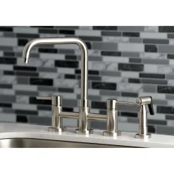 Kingston Brass Concord Two-Handle Deck Mount Bridge Kitchen Faucet with Brass Side Sprayer