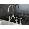 Kingston Brass English Country Deck Mount Kitchen Bridge Faucet with Brass Sprayer
