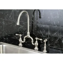 Kingston Brass English Country Deck Mount Kitchen Bridge Faucet with Brass Sprayer