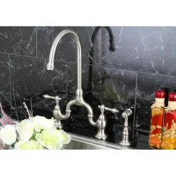 Kingston Brass English Country Deck Mount Kitchen Bridge Faucet with Brass Sprayer