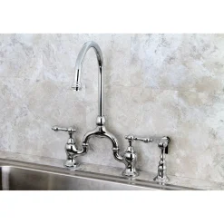 Kingston Brass English Country Deck Mount Kitchen Bridge Faucet with Brass Sprayer