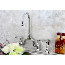 Kingston Brass English Country Deck Mount Kitchen Bridge Faucet with Brass Sprayer