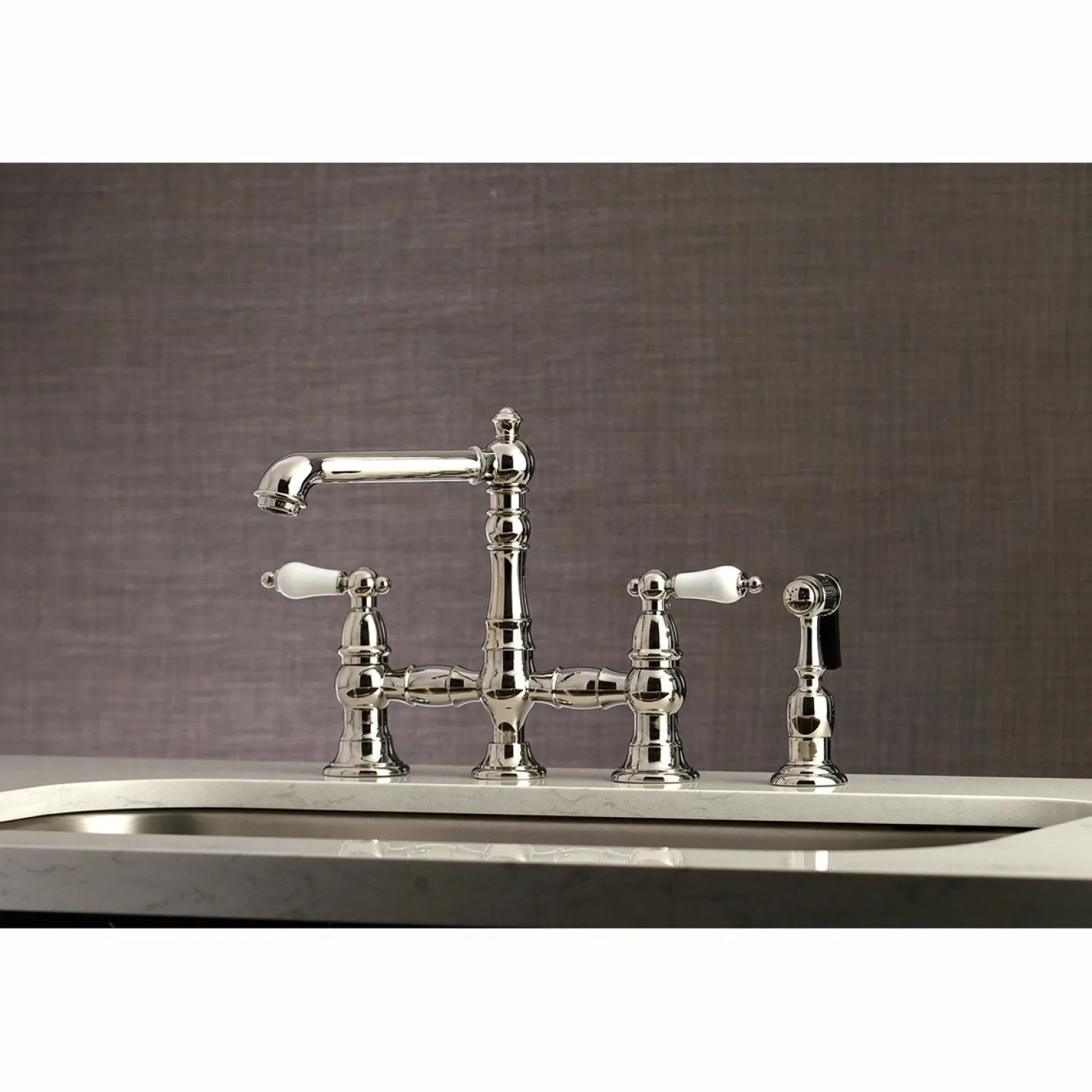 Kingston Brass English Country 4-Hole 8" Bridge Kitchen Faucet with Sprayer