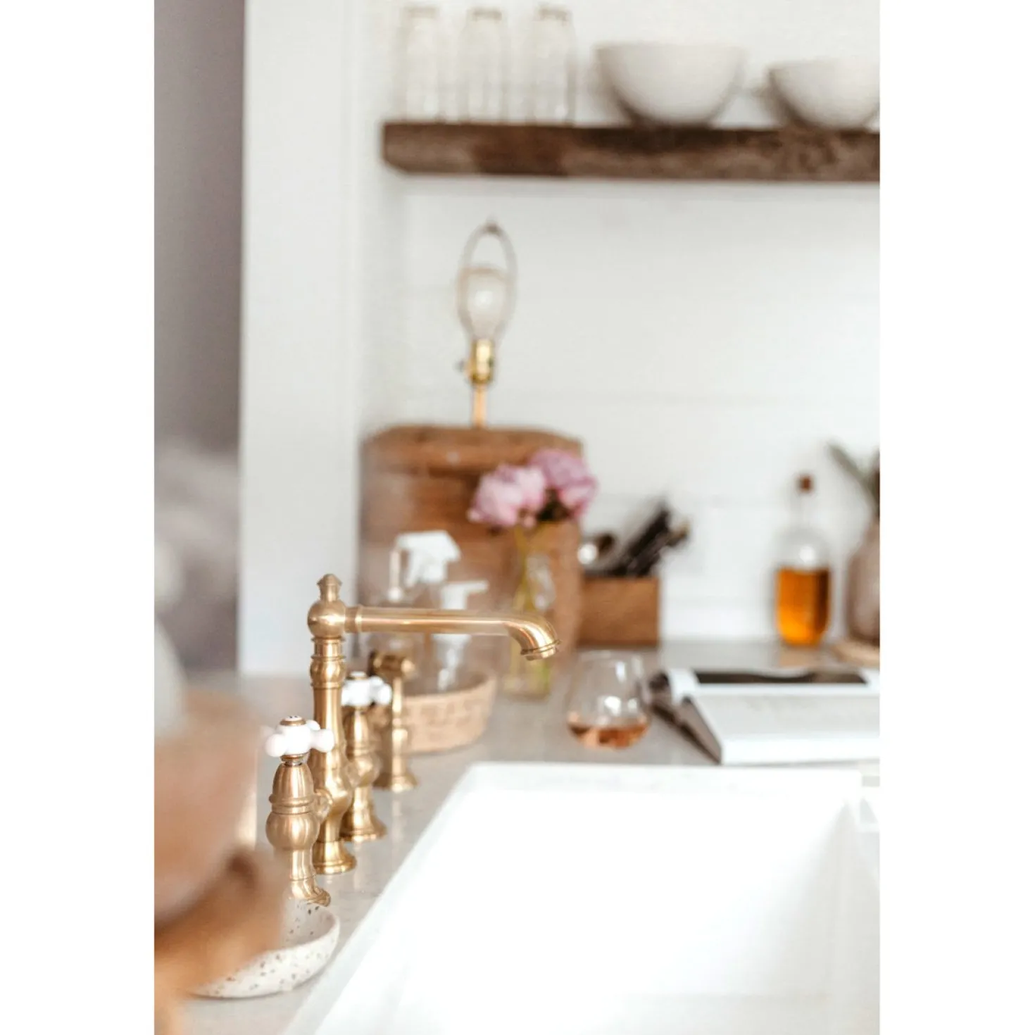 Kingston Brass English Country 8" Bridge 4-Hole Kitchen Faucet with Sprayer