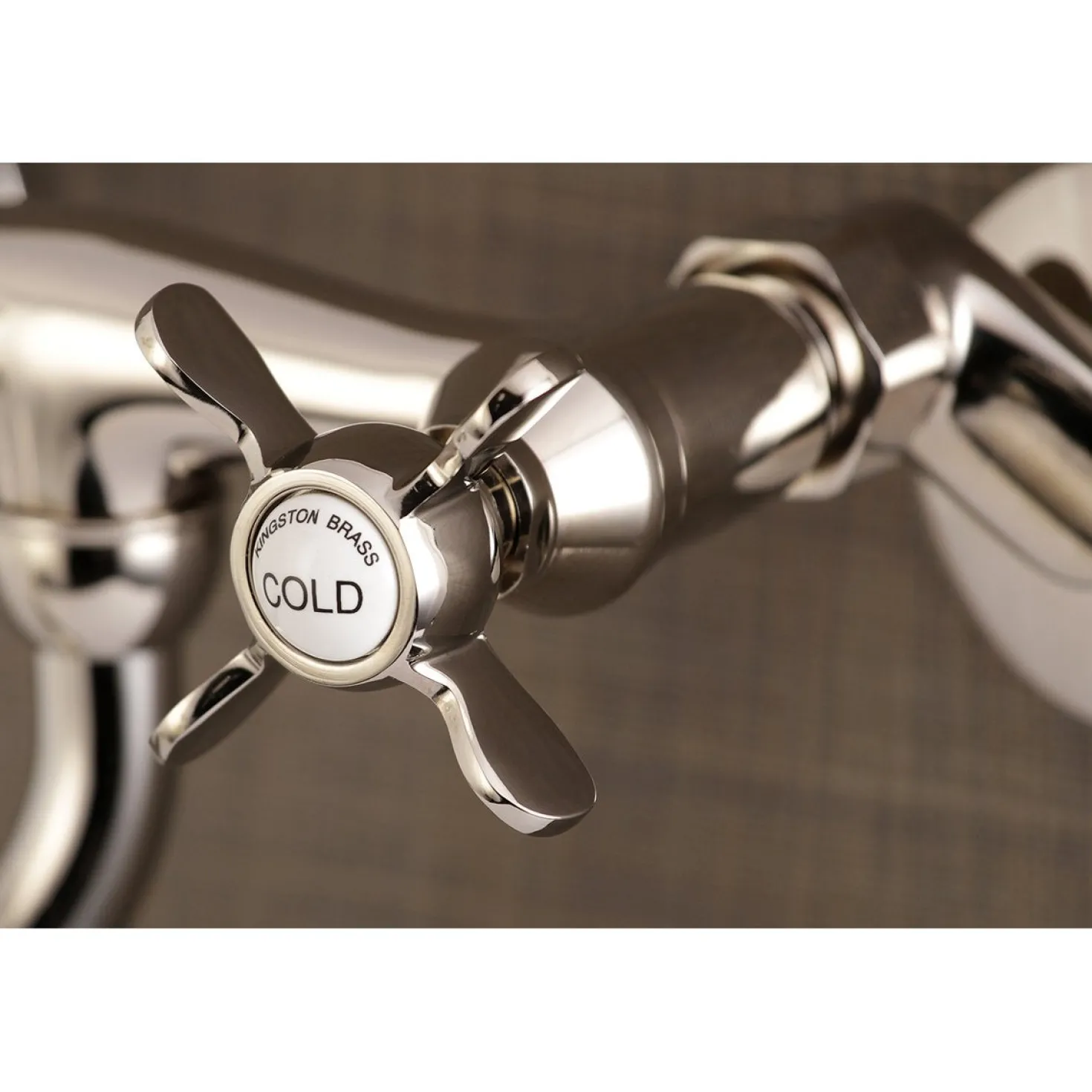 Kingston Brass Essex Adjustable Center Wall Mount Bathroom Faucet