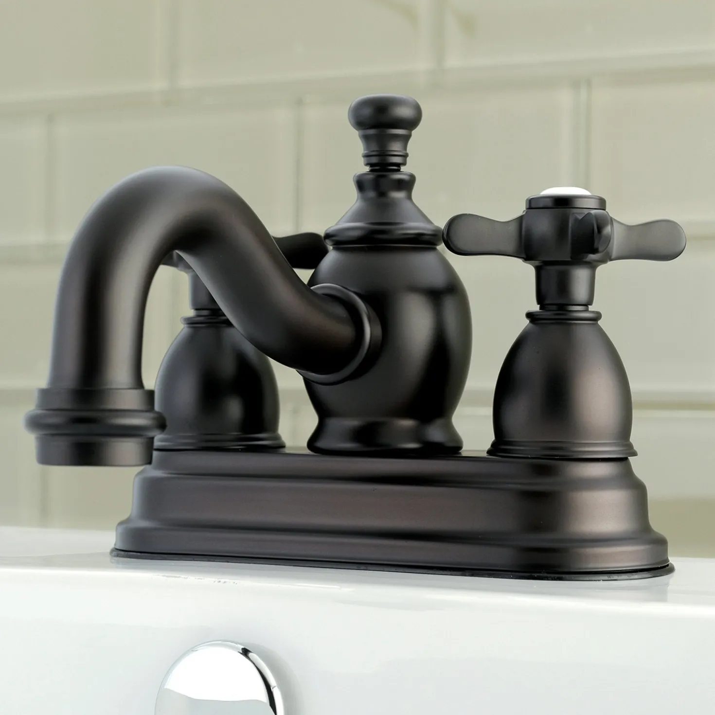 Kingston Brass Essex 4" Centerset Cross Handle Lavatory Faucet with Brass Pop-up
