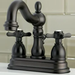 Kingston Brass Essex 4" Centerset Lavatory Faucet with Brass Pop-up