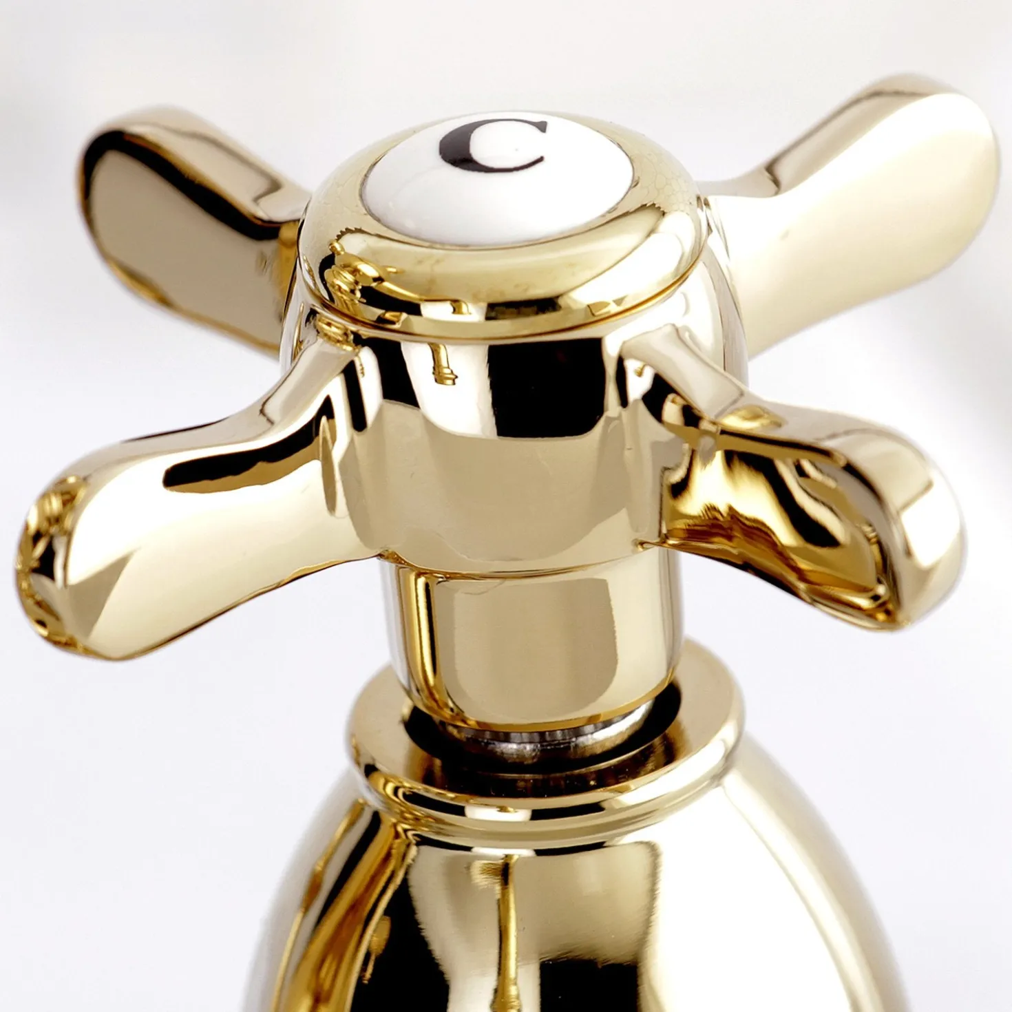 Kingston Brass Essex 4" Centerset Lavatory Faucet with Brass Pop-up