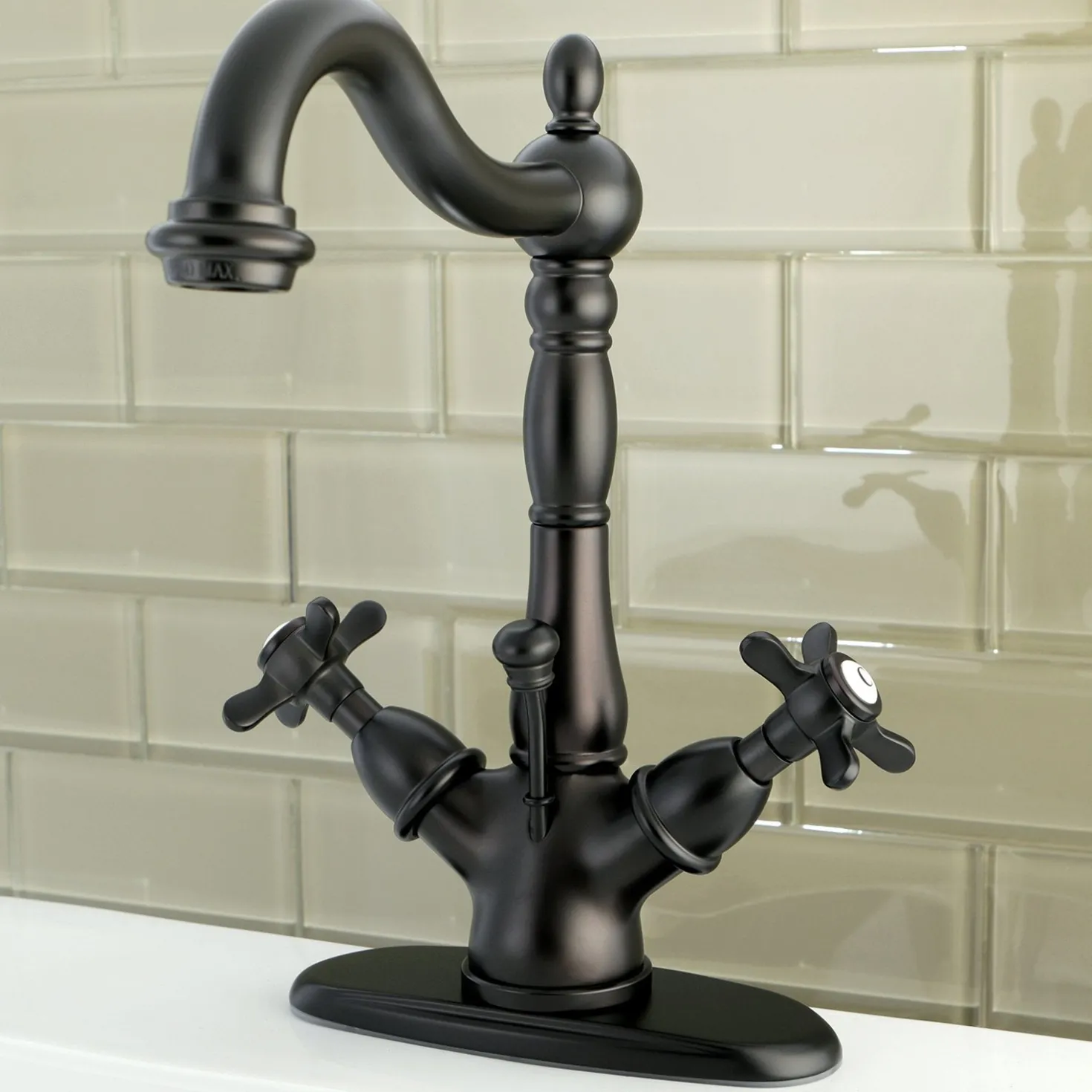 Kingston Brass Essex Classic 4" Centerset Lavatory Faucet with Brass Pop-up