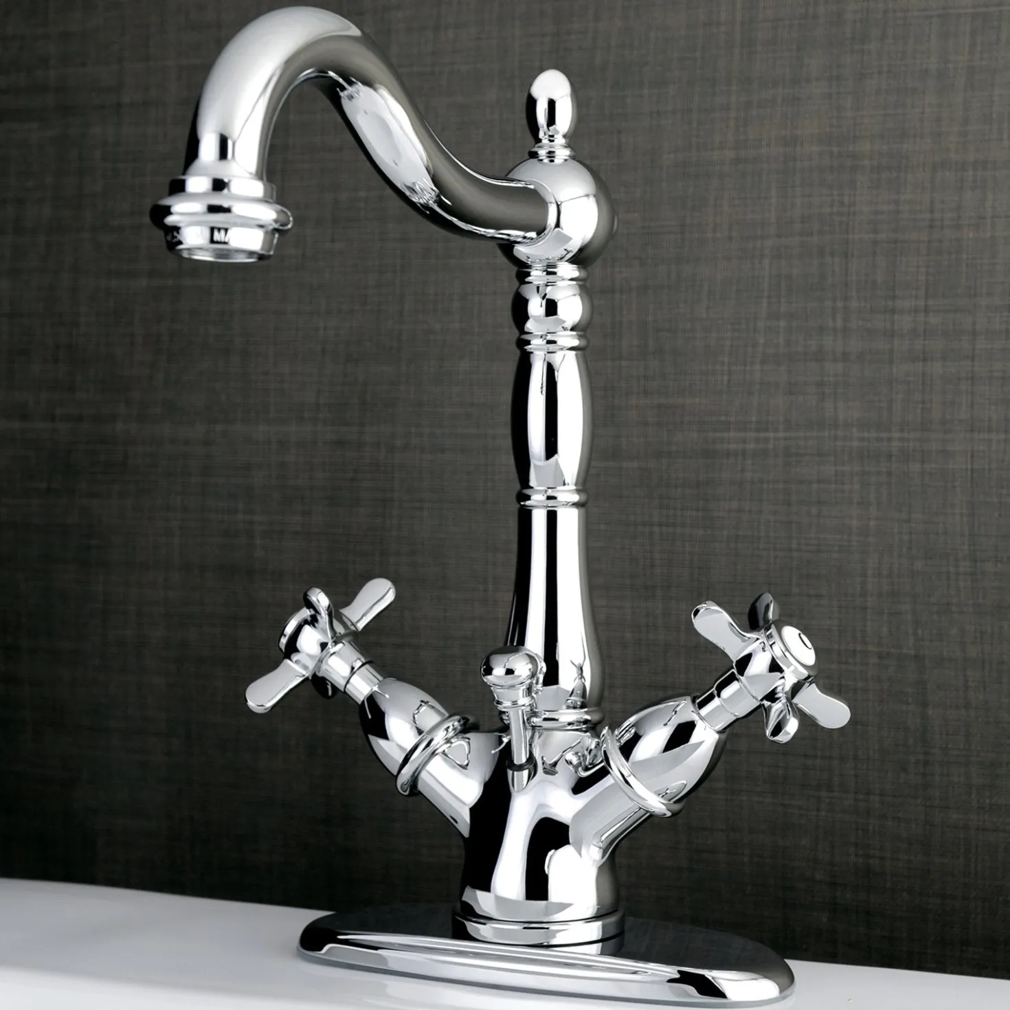 Kingston Brass Essex Classic 4" Centerset Lavatory Faucet with Brass Pop-up