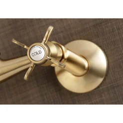 Kingston Brass Essex Cross-Handle 6-Inch Adjustable Center Wall Mount Kitchen Faucet