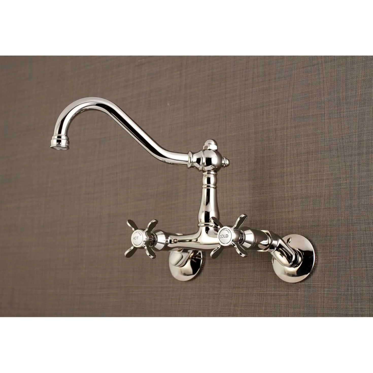 Kingston Brass Essex Cross-Handle 6-Inch Adjustable Center Wall Mount Kitchen Faucet