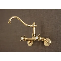 Kingston Brass Essex Cross-Handle 6-Inch Adjustable Center Wall Mount Kitchen Faucet