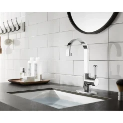 Kingston Brass Fauceture Paris Single-Handle Bathroom Faucet with Deck Plate and Drain