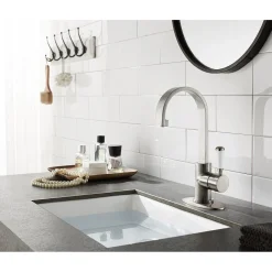 Kingston Brass Fauceture Paris Single-Handle Bathroom Faucet with Deck Plate and Drain