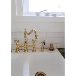 Kingston Brass French Country Kitchen Bridge Faucet with Brass Sprayer