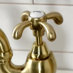 Kingston Brass Heirloom French Country Two-Handle 3-Hole Deck Mount Bridge Kitchen Faucet with Brass Sprayer