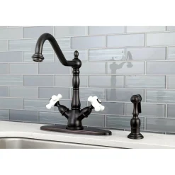 Kingston Brass Heritage Deck Mount 2-Handle Kitchen Faucet with Brass Sprayer and 8-Inch Plate