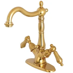 Kingston Brass Heritage Deck Mount 4-Inch Centerset Bathroom Faucet with Pop-Up Drain