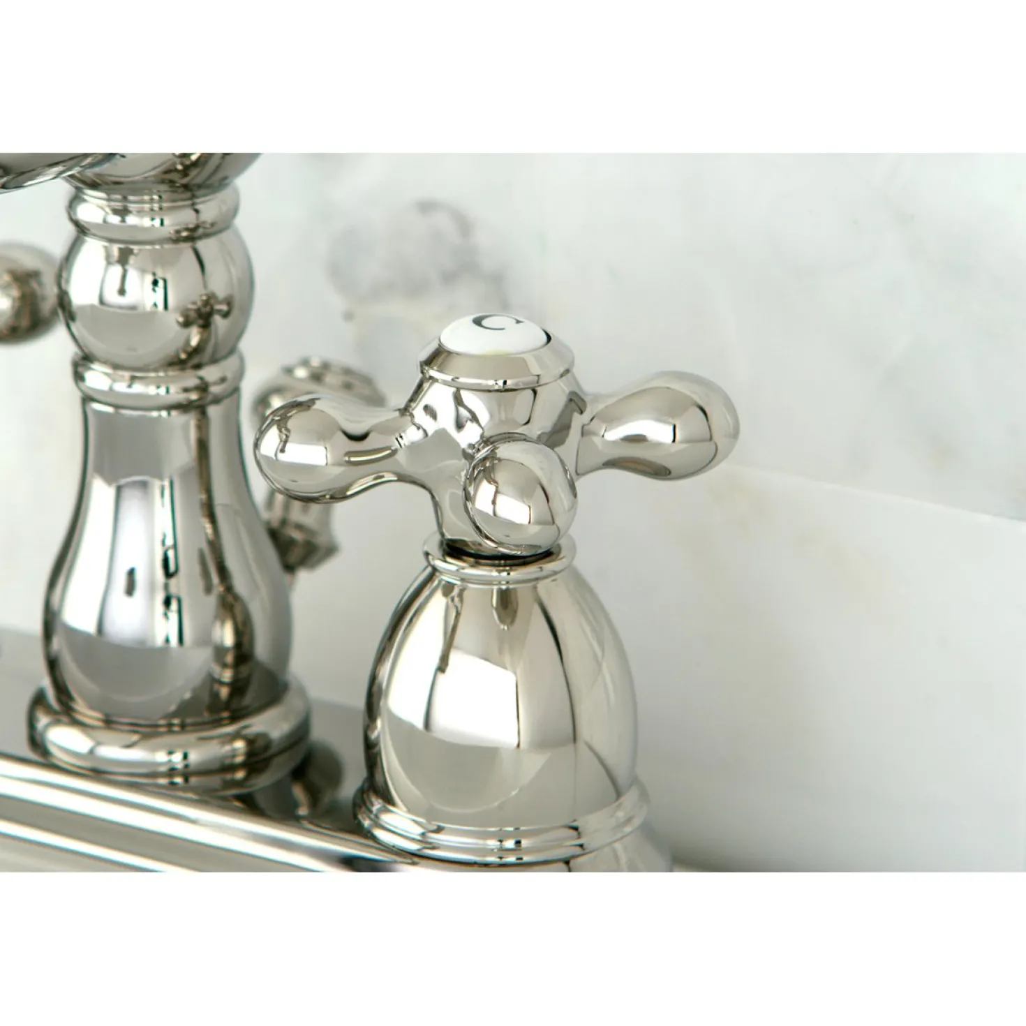Kingston Brass Heritage Deck Mount 4-Inch Centerset Bathroom Faucet