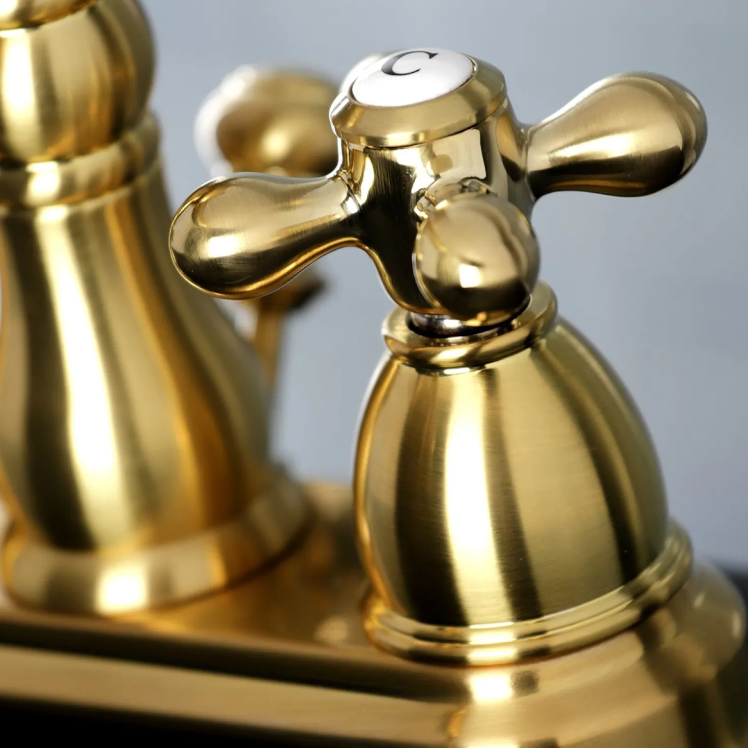 Kingston Brass Heritage Deck Mount 4-Inch Centerset Bathroom Faucet