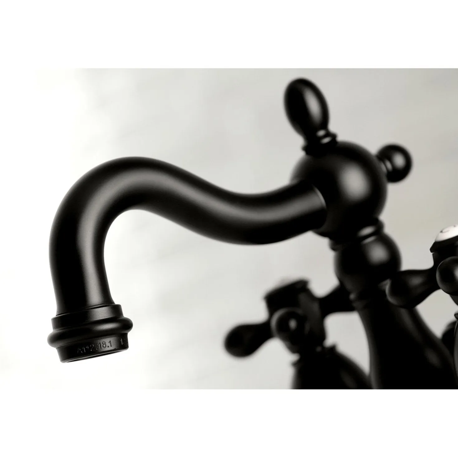 Kingston Brass Heritage Deck Mount 4-Inch Centerset Bathroom Faucet