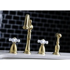 Kingston Brass Heritage 4-Hole Widespread Kitchen Faucet with Brass Sprayer