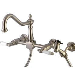 Kingston Brass Heritage 3-Hole 8-Inch Wall Mount Kitchen Faucet with Brass Sprayer