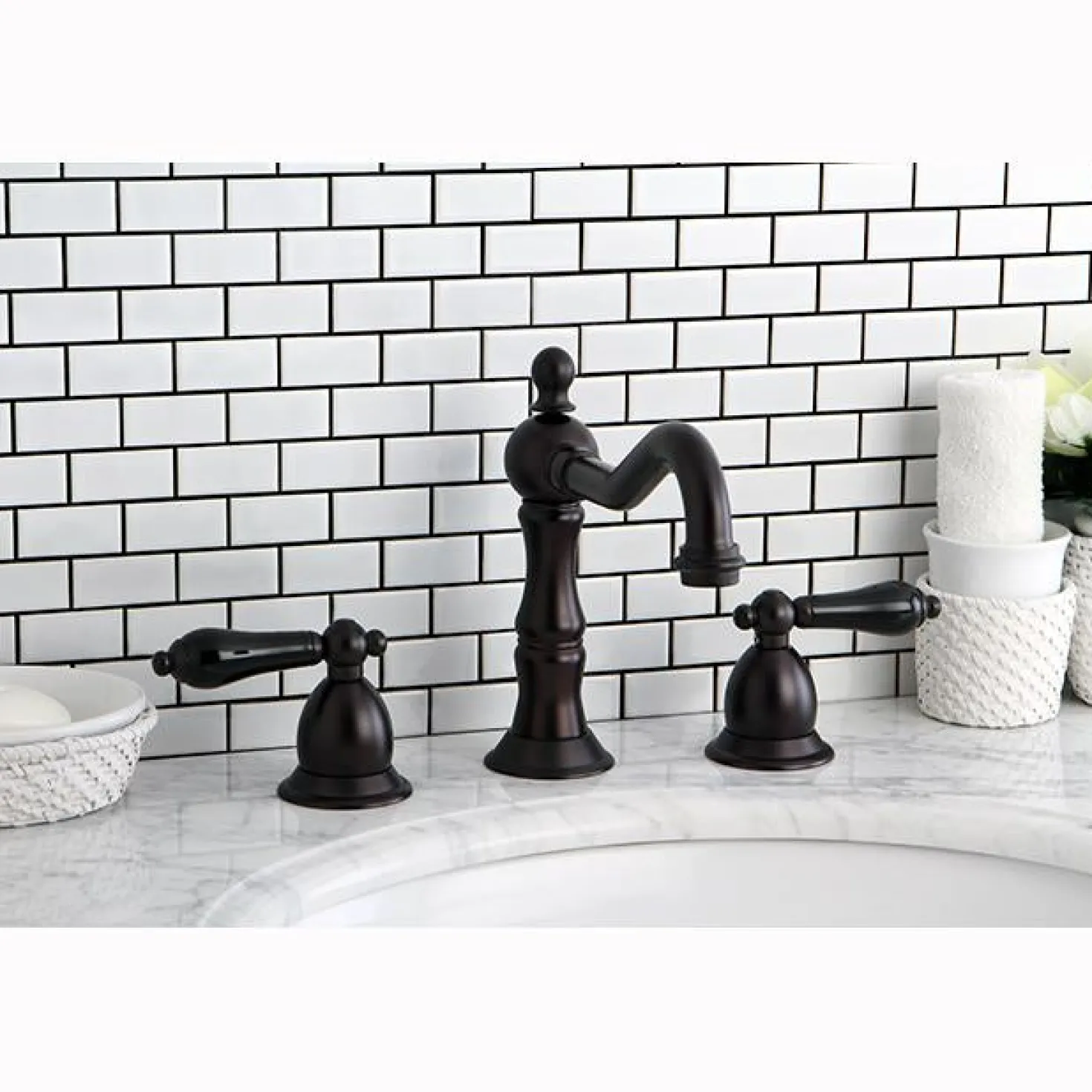 Kingston Brass Heritage Onyx Traditional Widespread Lavatory Faucet with Black Porcelain Lever Handle