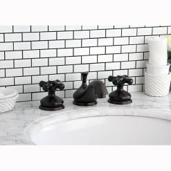 Kingston Brass Heritage Onyx Traditional Widespread Lavatory Faucet with Black Porcelain Cross Handle