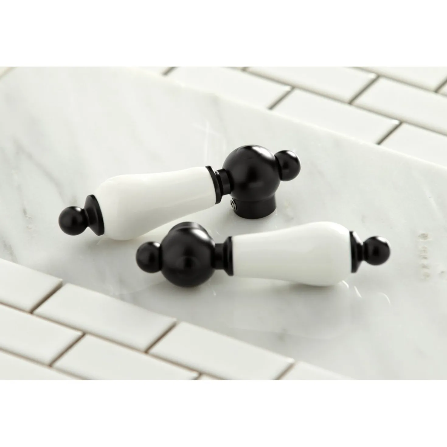 Kingston Brass Heritage Wall Mount 8-Inch Center Bathroom Faucet