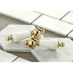 Kingston Brass Heritage Wall Mount 8-Inch Center Bathroom Faucet