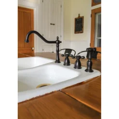 Kingston Brass Heritage Widespread Kitchen Faucet with Brass Sprayer